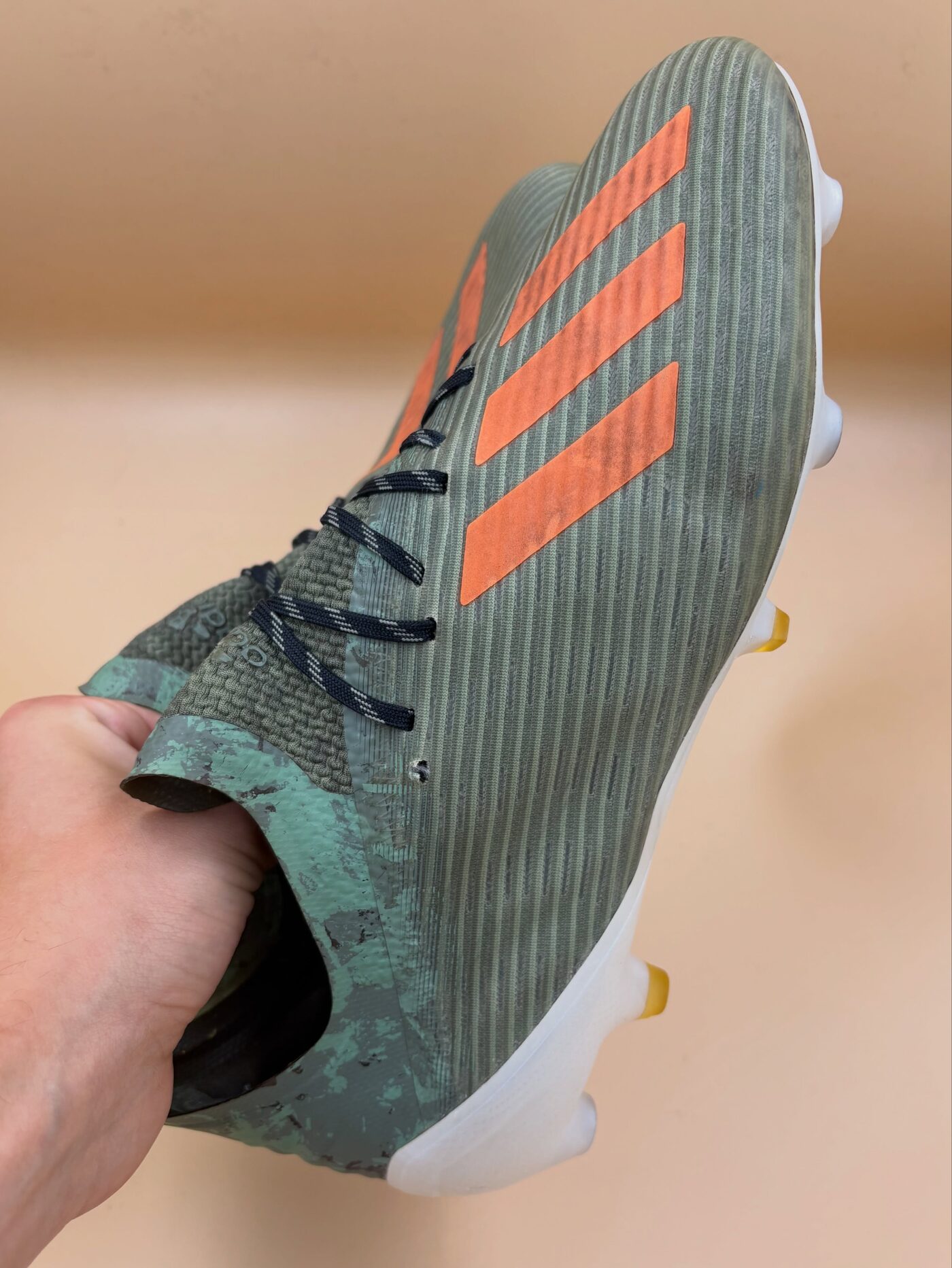 Green and orange Adidas Kakari boot